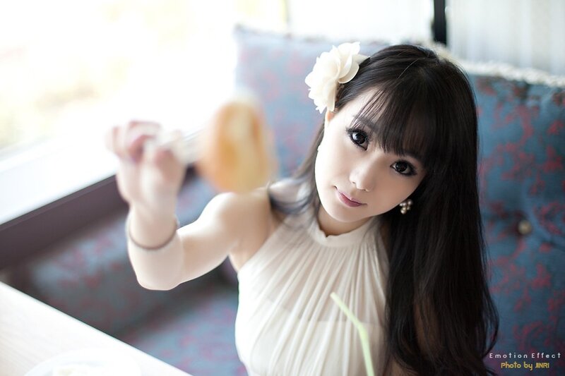 Woman with Flower in Hair — White, Calm, Afternoon, Photograph, Earring