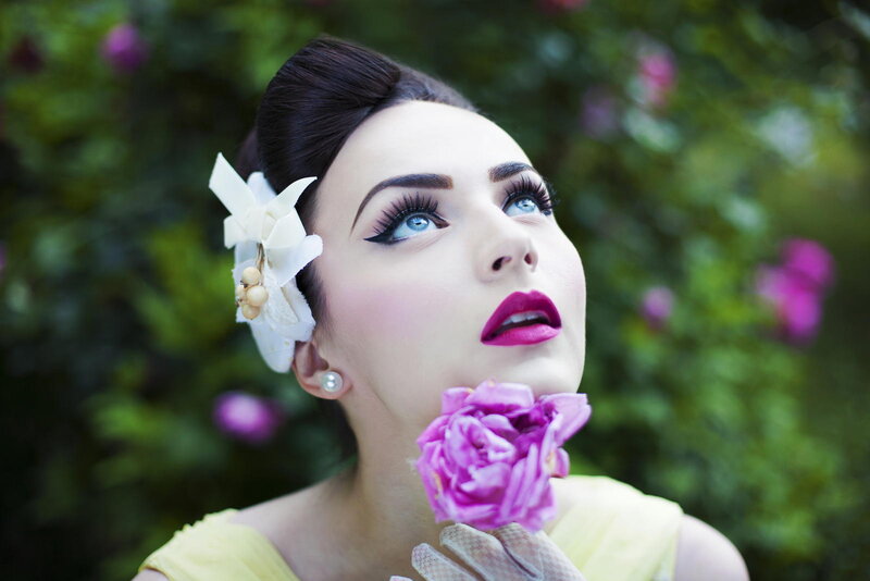 Woman with Flower in Hand — Yellow