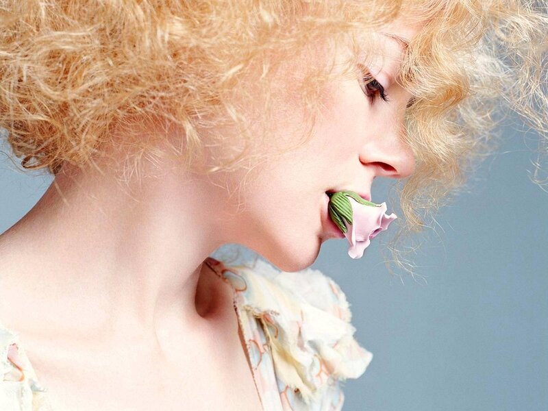 Woman with Flower in Mouth — Blonde
