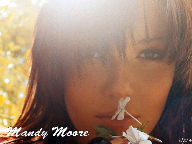 woman with flower in sunlight