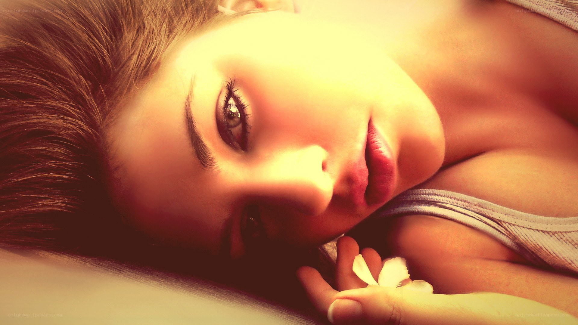 woman with flower lying down