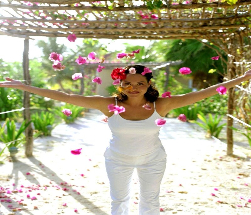 woman with flower petals