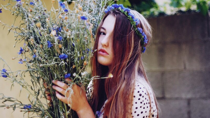 woman with flowers and crown