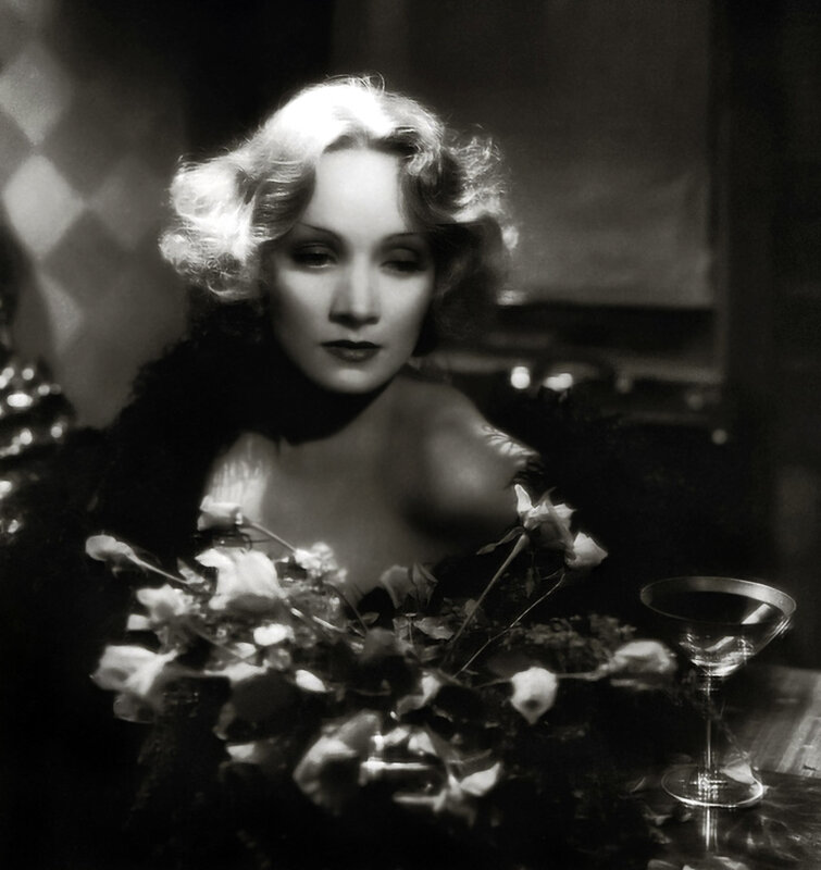 woman with flowers and drink