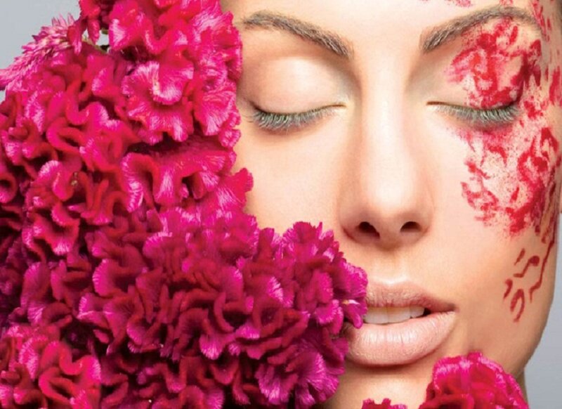 woman with flowers and face paint