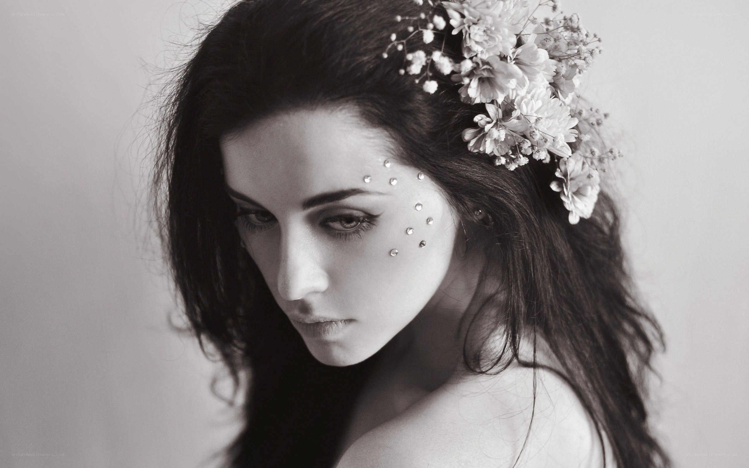 woman with flowers and gems