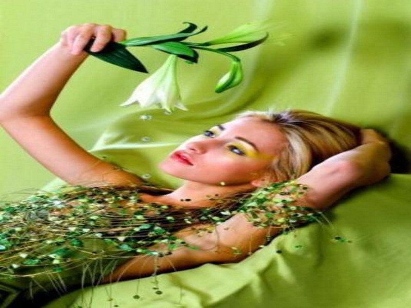 woman with flowers and green background