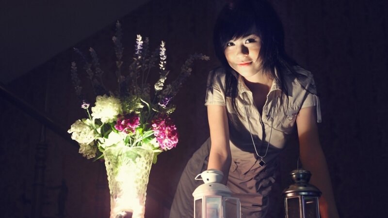 woman with flowers and lanterns