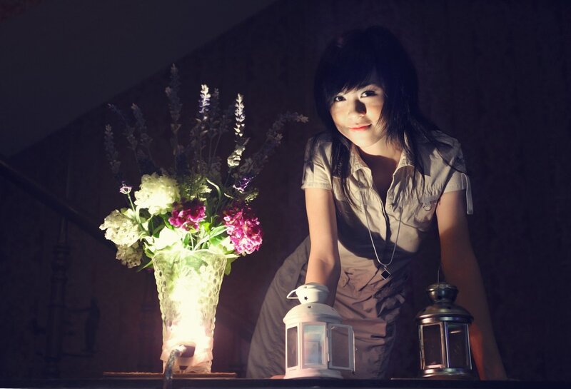 woman with flowers and lanterns