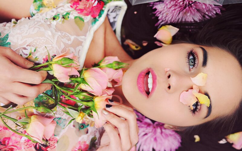 woman with flowers and makeup