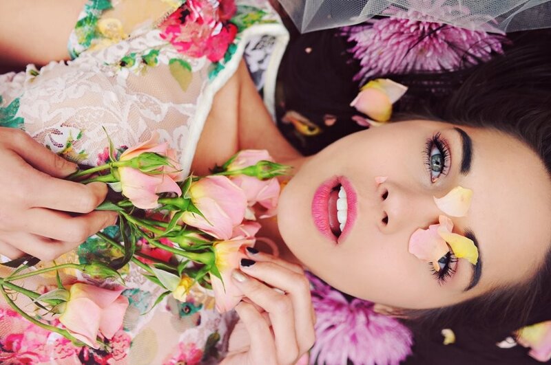 woman with flowers and makeup