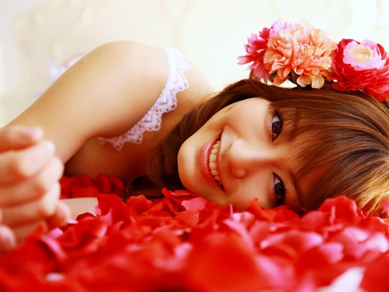 woman with flowers and petals