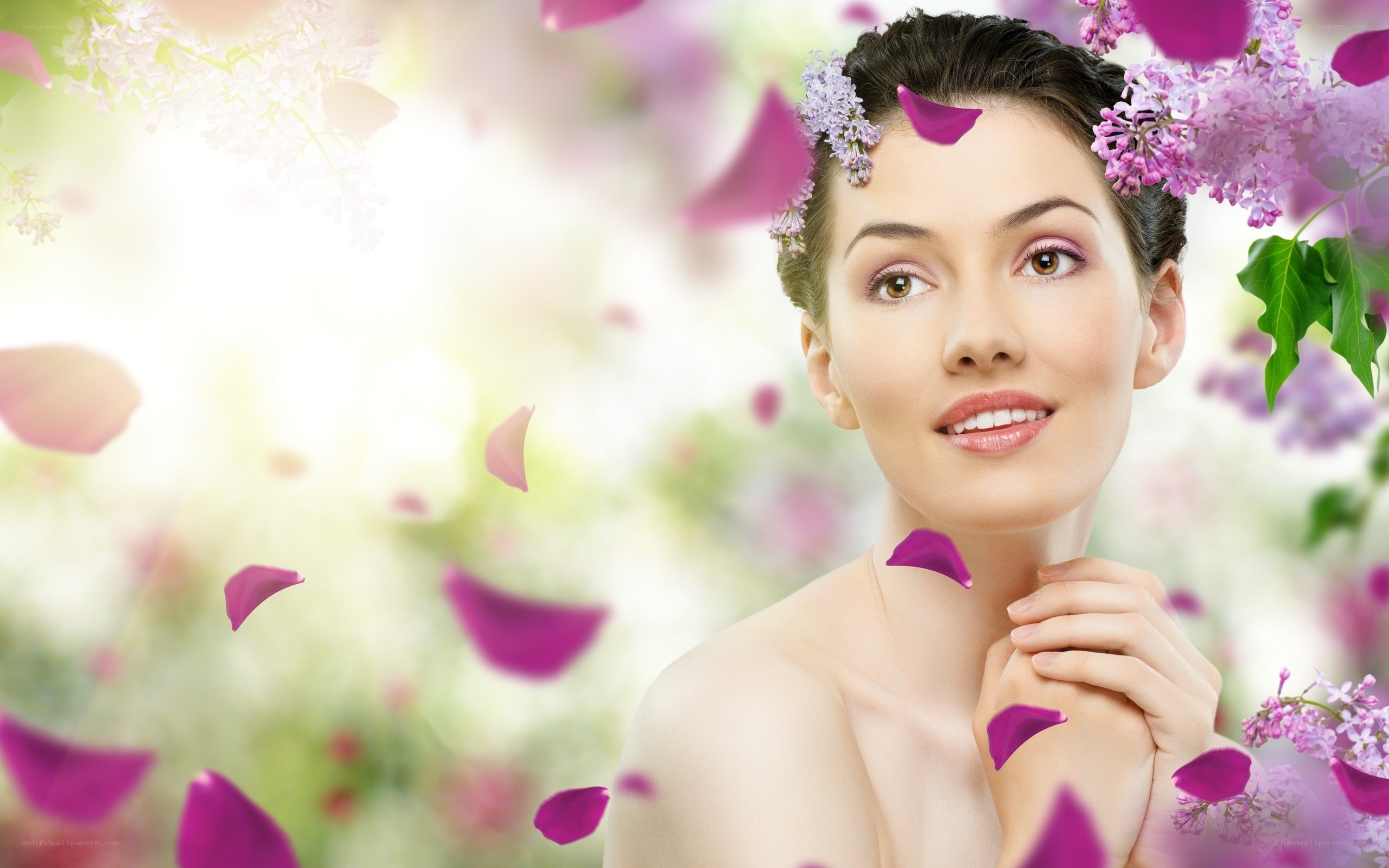 woman with flowers and petals