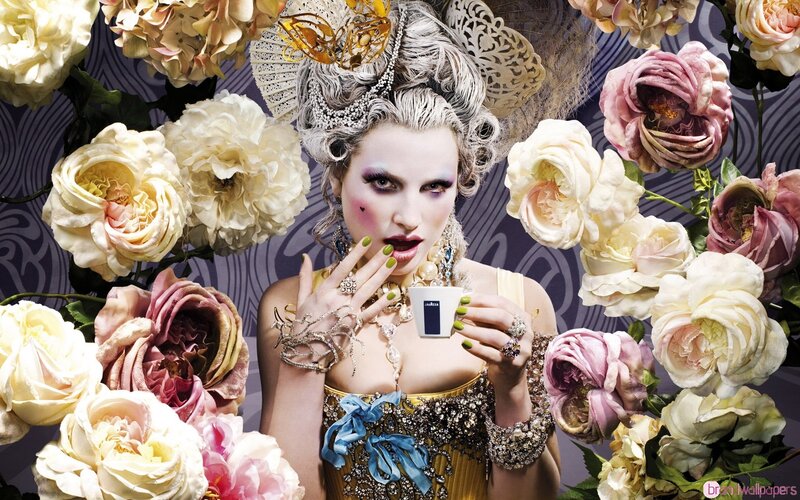 woman with flowers and tea cup