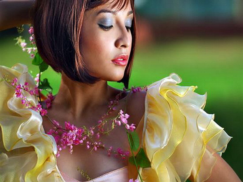 woman with flowers and yellow dress