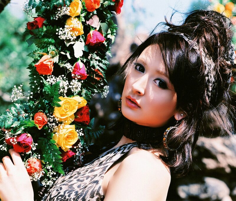 Woman with Flowers — Green, Dramatic, Afternoon, Photograph