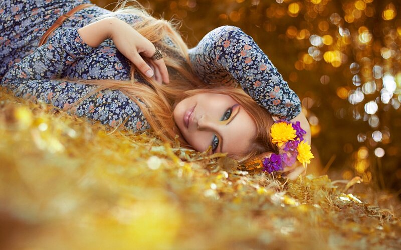 woman with flowers in autumn