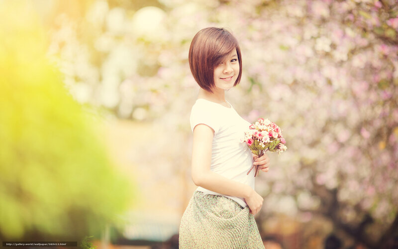 Woman with flowers in garden