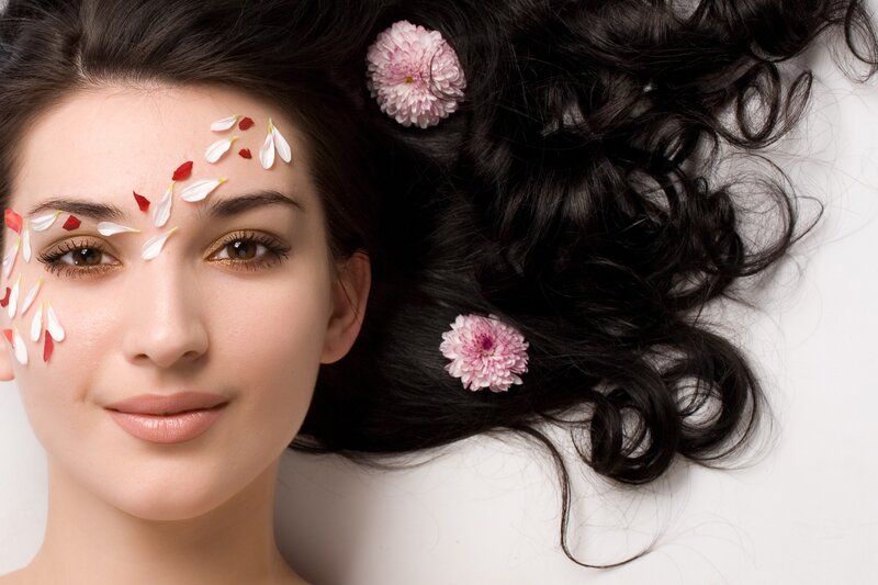 Woman with Flowers in Hair — Black, Serene, Photograph, Petals