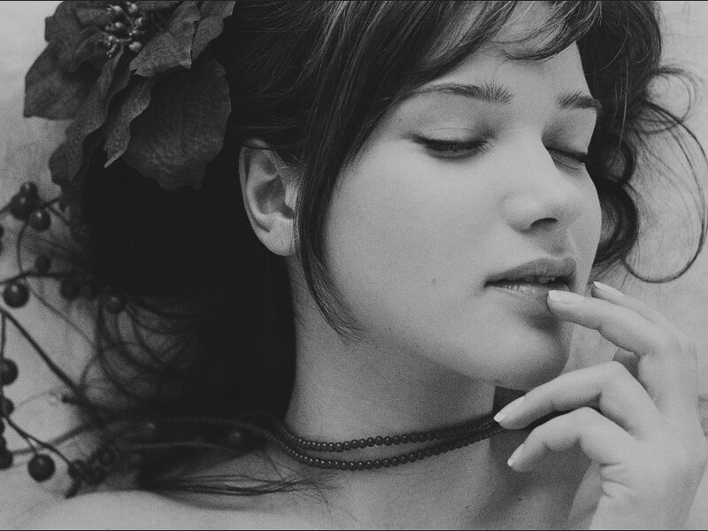Woman with Flowers in Hair — Black, Serene, Photograph