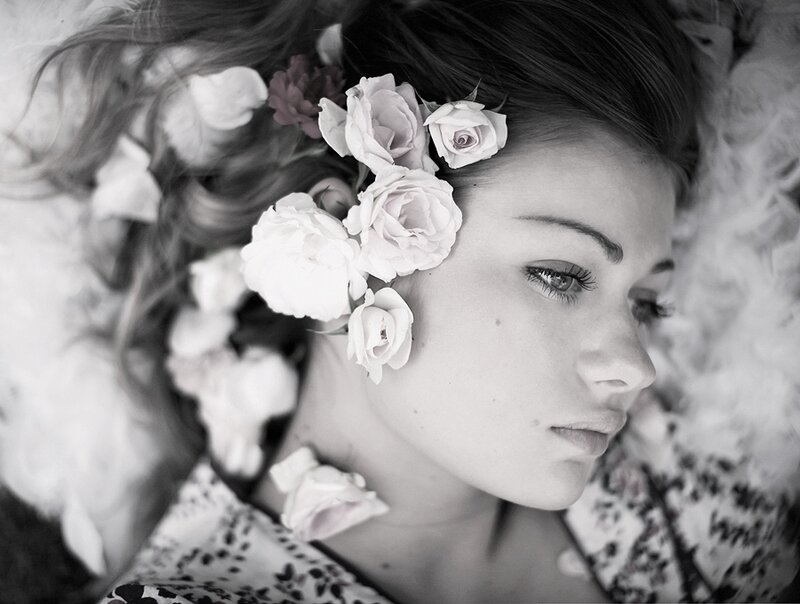 Woman with Flowers in Hair — Black, Serene