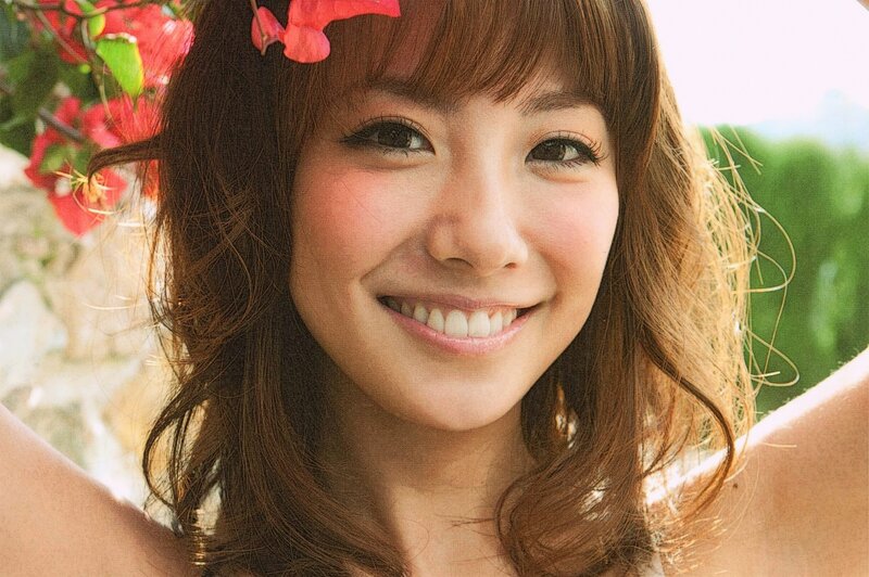 Woman with Flowers in Hair — Brown, Happy