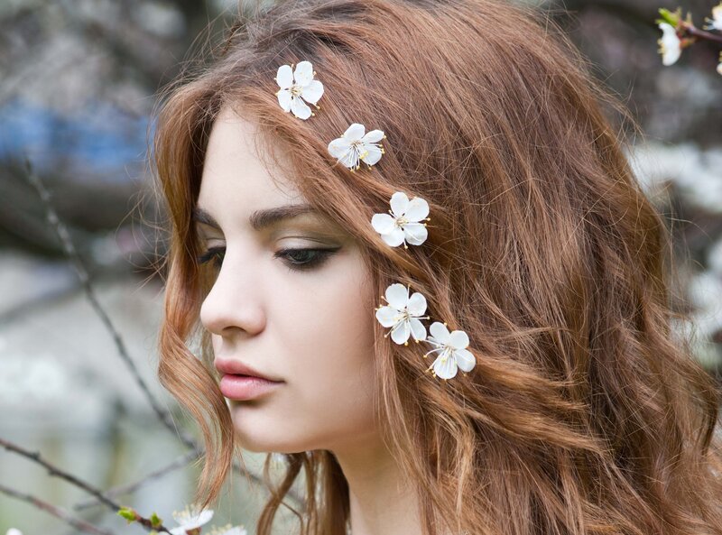 Woman with Flowers in Hair — Brown, Serene, Spring