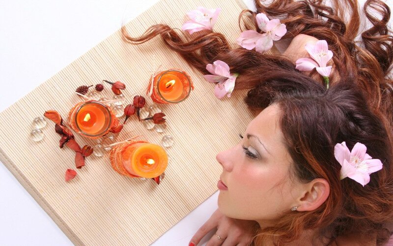Woman with Flowers in Hair — Orange, Serene