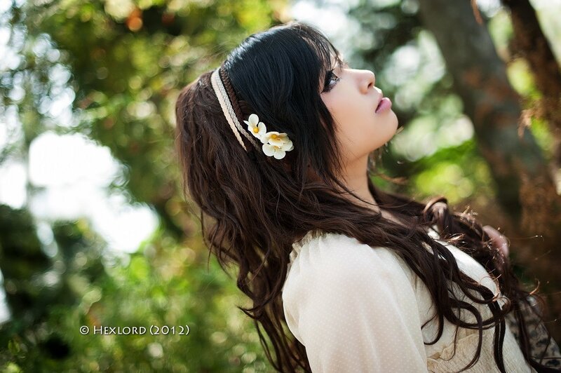 woman with flowers in her hair