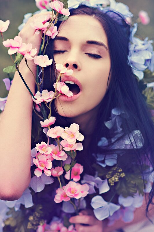 woman with flowers in her hair