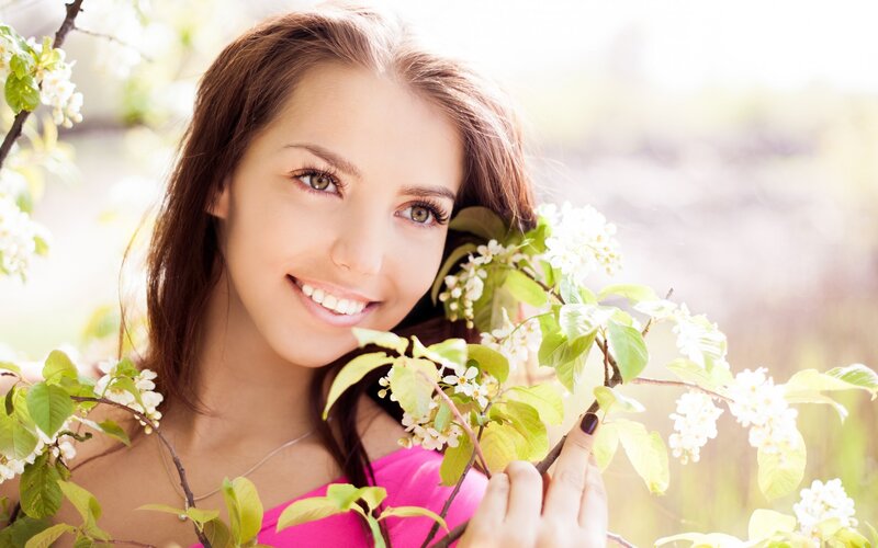 woman with flowers in spring