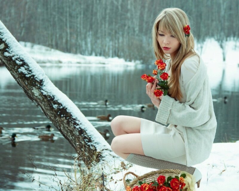 Woman with flowers in winter
