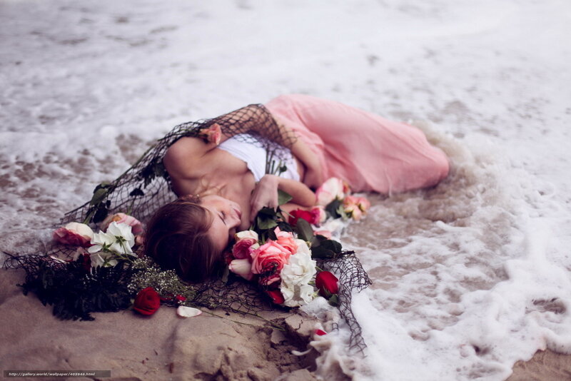 woman with flowers on beach