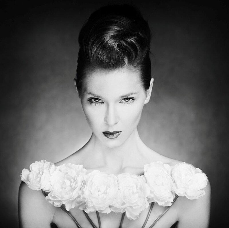 Woman with Flowers on Shoulders