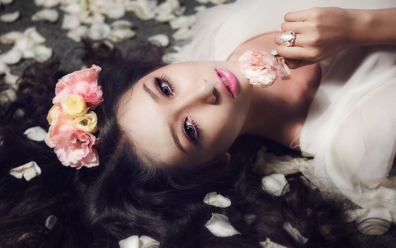 Woman with Flowers — White, Serene, Photograph, Petals