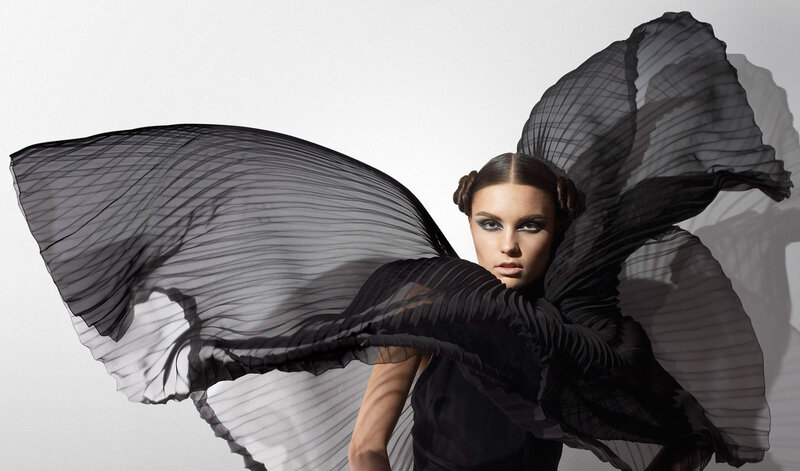 Woman with Flowing Black Fabric