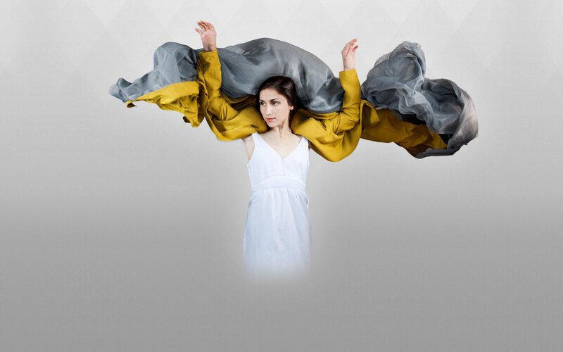 woman with flowing fabric