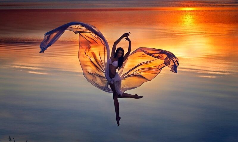 Woman with Flowing Fabric — Orange