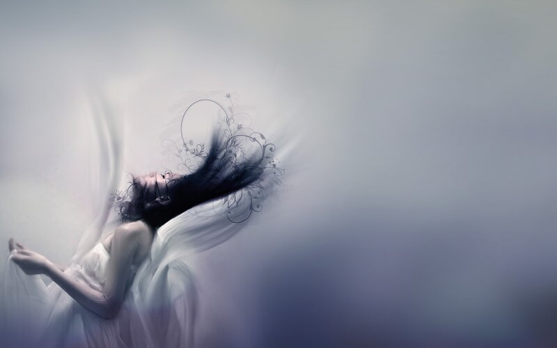 woman with flowing hair and dress