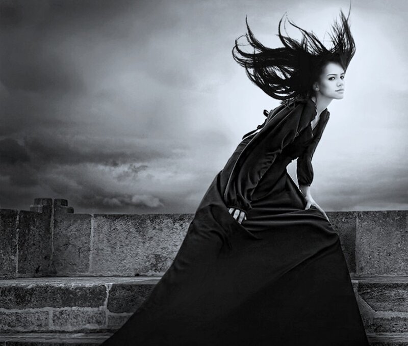 Woman with Flowing Hair — Black, Dramatic, Photograph, Stone Wall