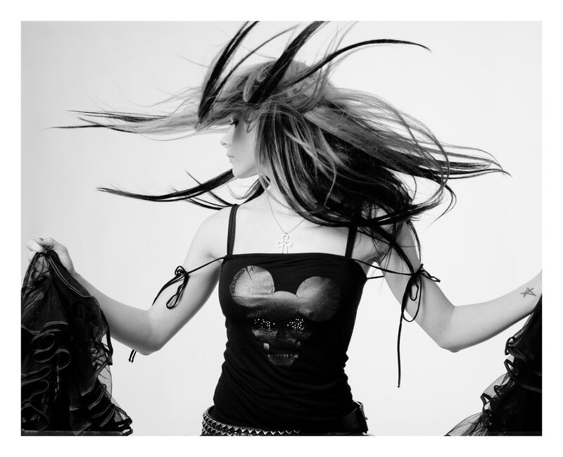 woman with flowing hair in black and white