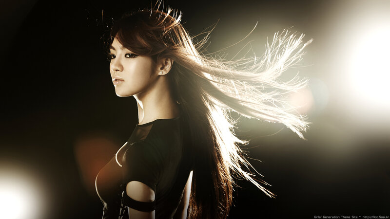 woman with flowing hair in light