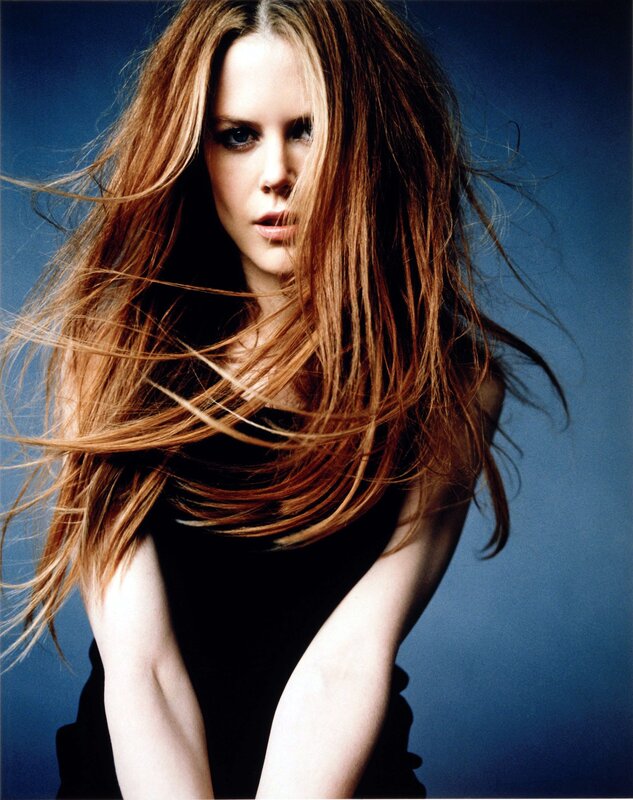 woman with flowing red hair