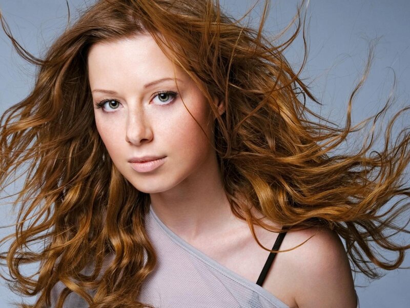 woman with flowing red hair