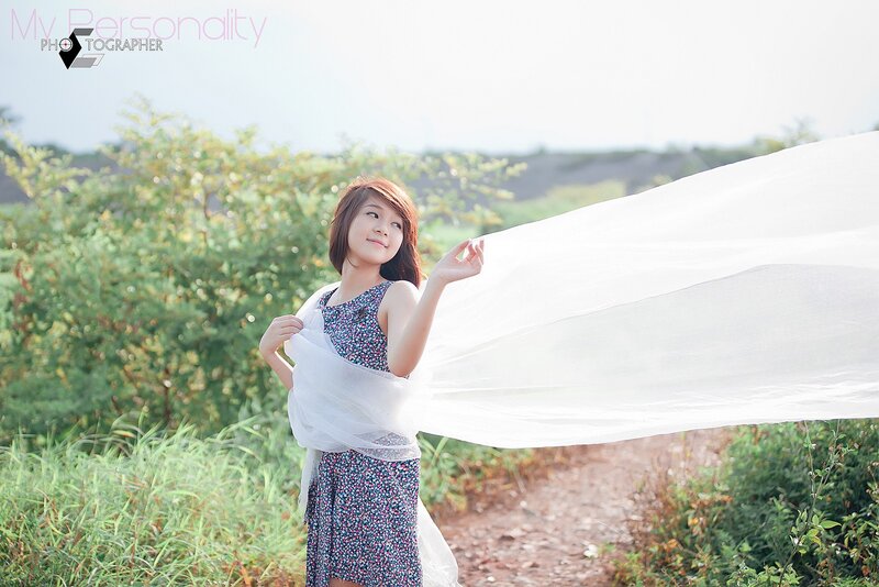 Woman with flowing white scarf