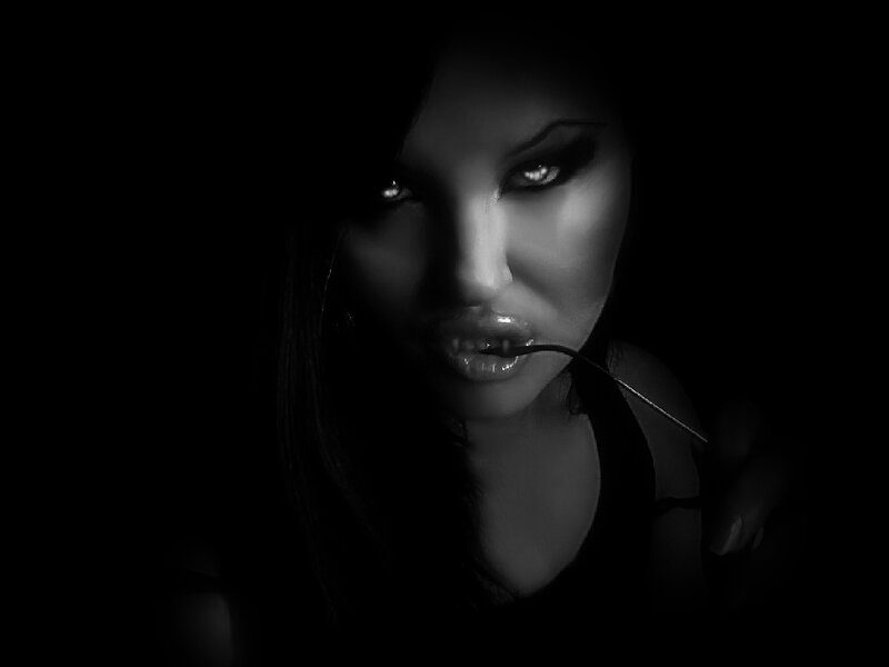 woman with fork in mouth