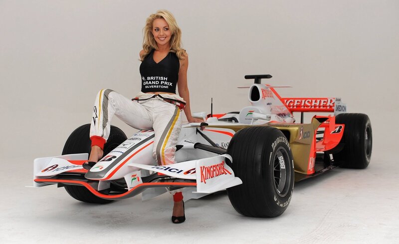 Woman with Formula One car