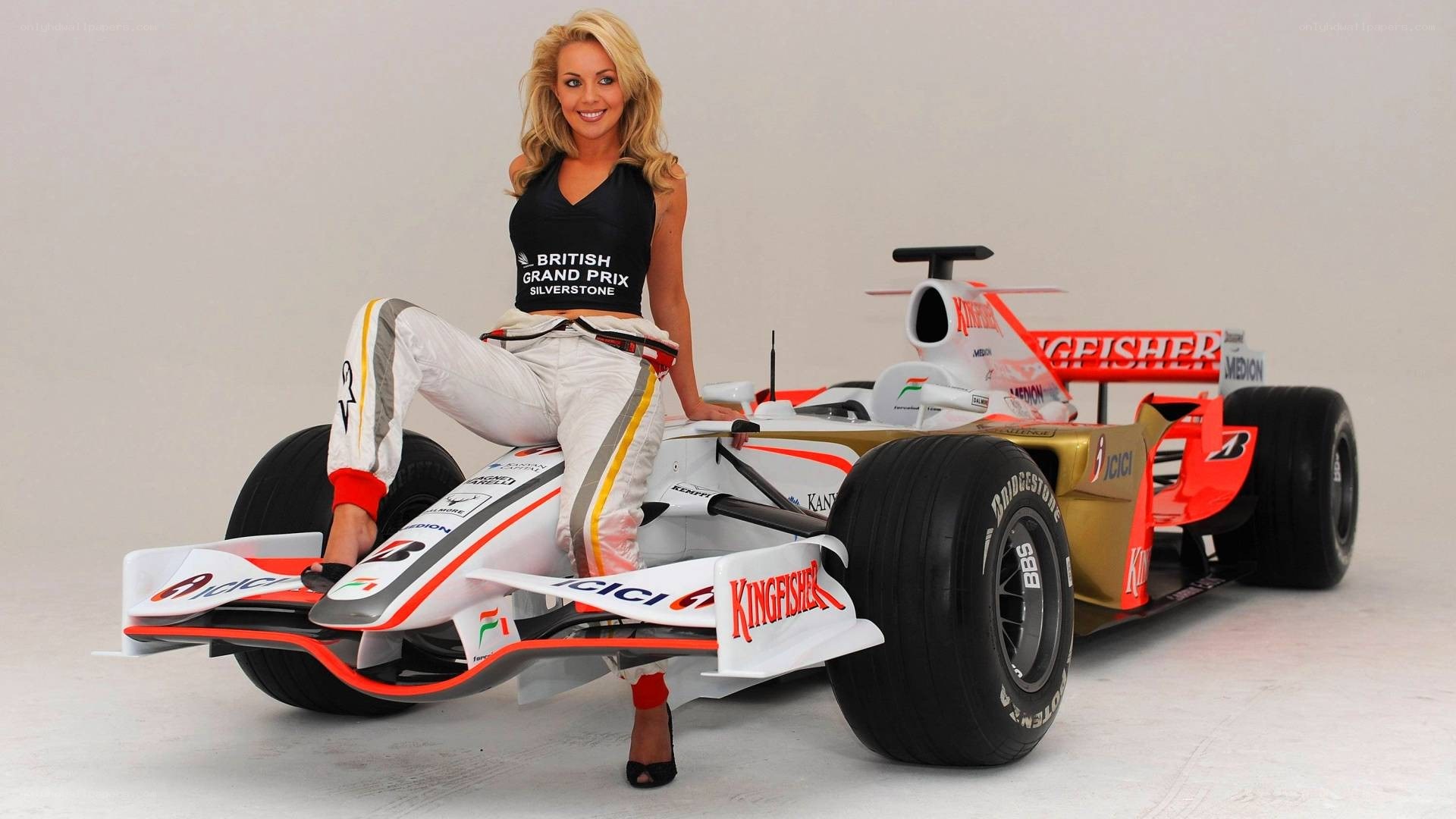 Woman with Formula One car