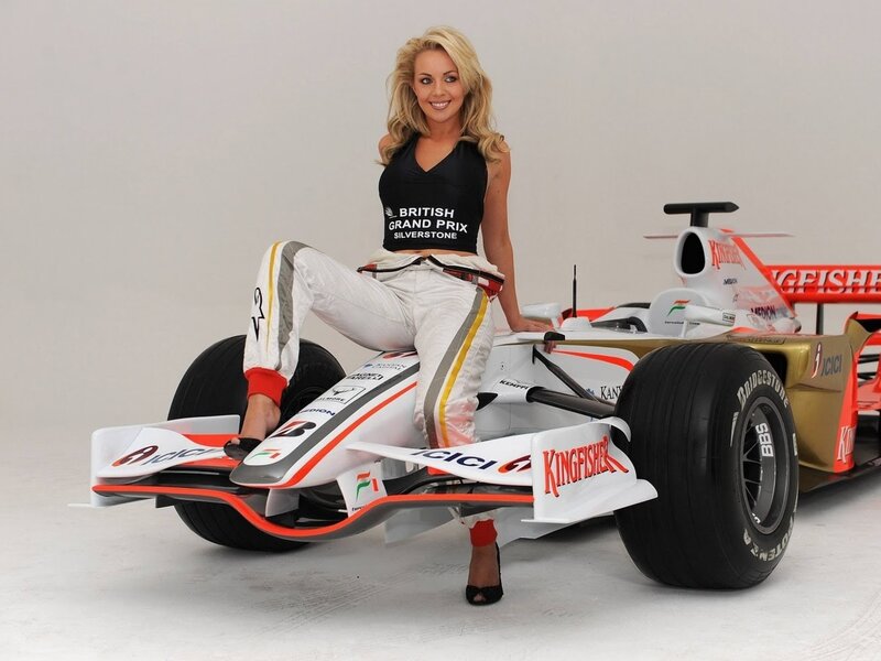 Woman with Formula One car