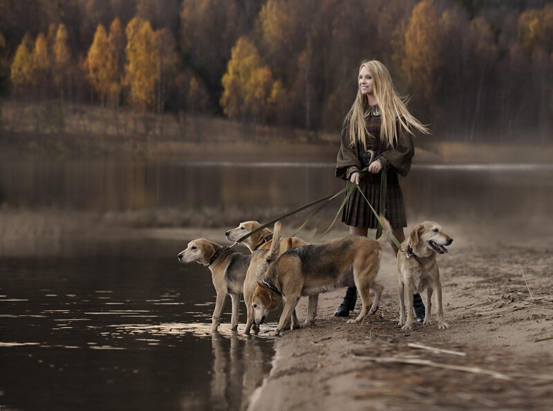 Woman with Four Dogs